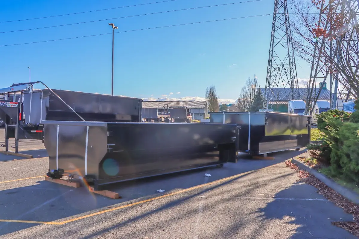 Roll-off dumpster ready for waste disposal at job site for 15 Yard Dumpster Rental in Irving